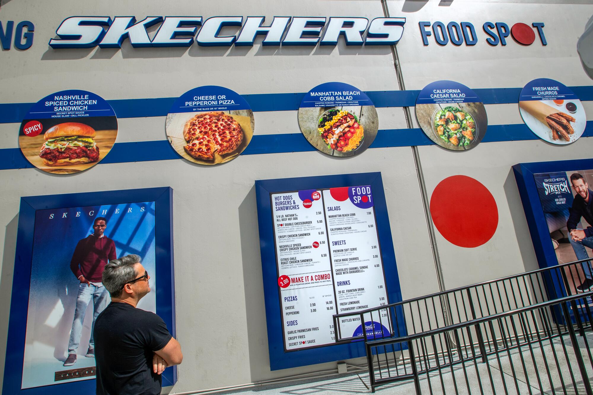 The outdoor menu at Skechers Food Spot, a restaurant at a shoe outlet. "Why not?"