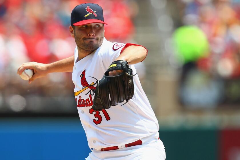 St. Louis starter Lance Lynn delivers a pitch during the Cardinals' 3-2 victory Sunday over the Miami Marlins.