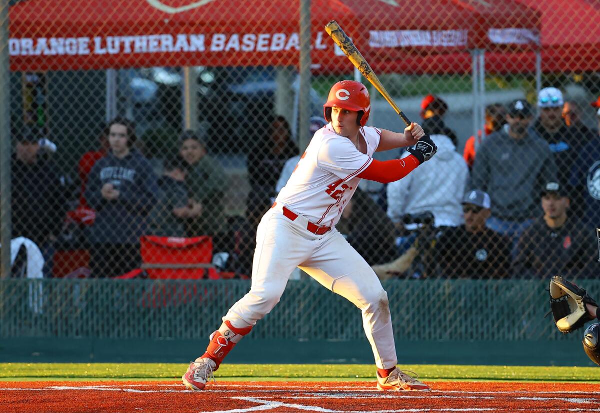 Sam Burgess of No. 1 Corona is in the batter's box waiting for a pitch.