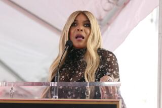 TV talk show host Wendy Williams appears at a ceremony honoring her with a star on the Hollywood Walk of Fame