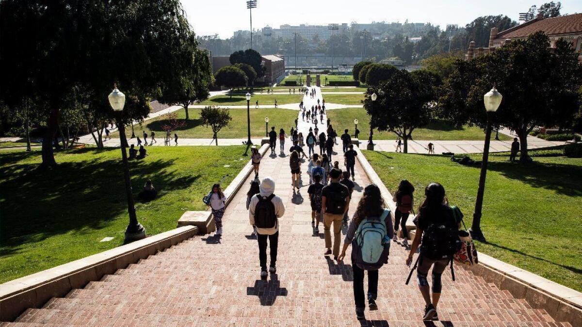 Students walk on the UCLA campus in Westwood on April 25, 2018.