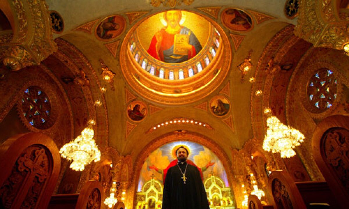 Father John Bakas basks in the splendor of St. Sophia Greek Orthodox Cathedral in the Byzantine-Latino quarter near downtown Los Angeles.