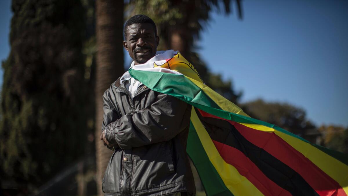 A #ThisFlag activist in Pretoria, South Africa, on July 14, 2016, during a march to the Zimbabwean Embassy. (MARCO LONGARI / AFP/Getty Images)