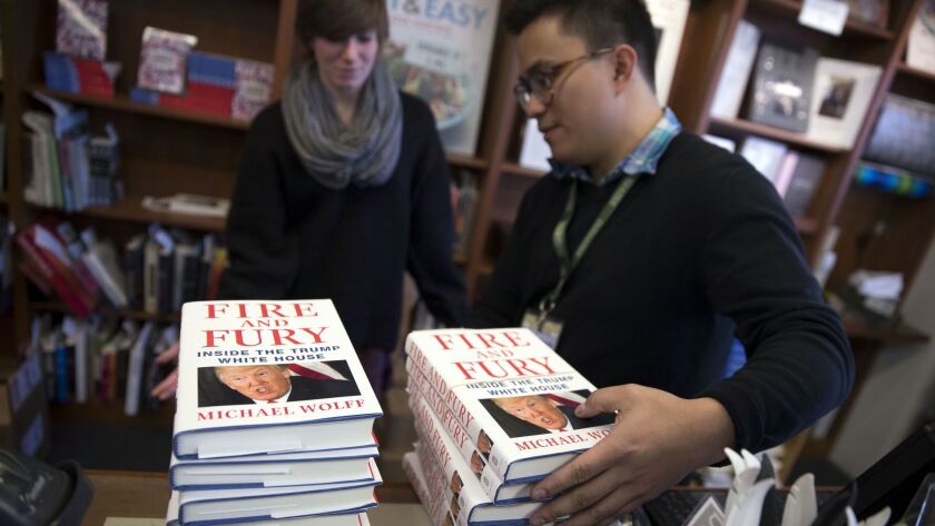 Copies of "Fire and Fury" are stacked Friday at Politics and Prose bookstore in Washington.