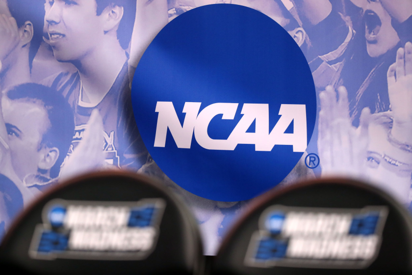 SALT LAKE CITY, UT - MARCH 16: The NCAA logo is seen in the second half of the game between.