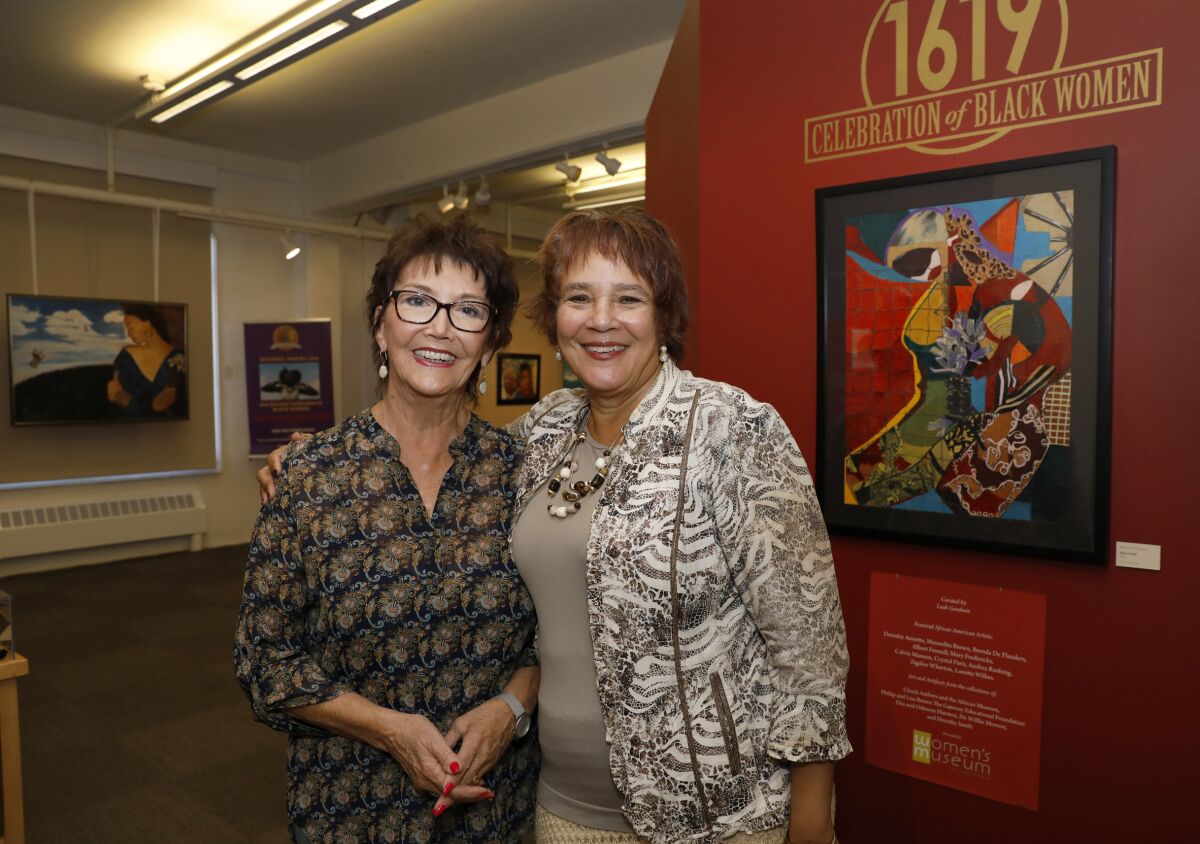 “We wanted to tell a national story with local flavor," said curator Leah Goodwin (right, pictured here with Ashley Gardner from the museum).
