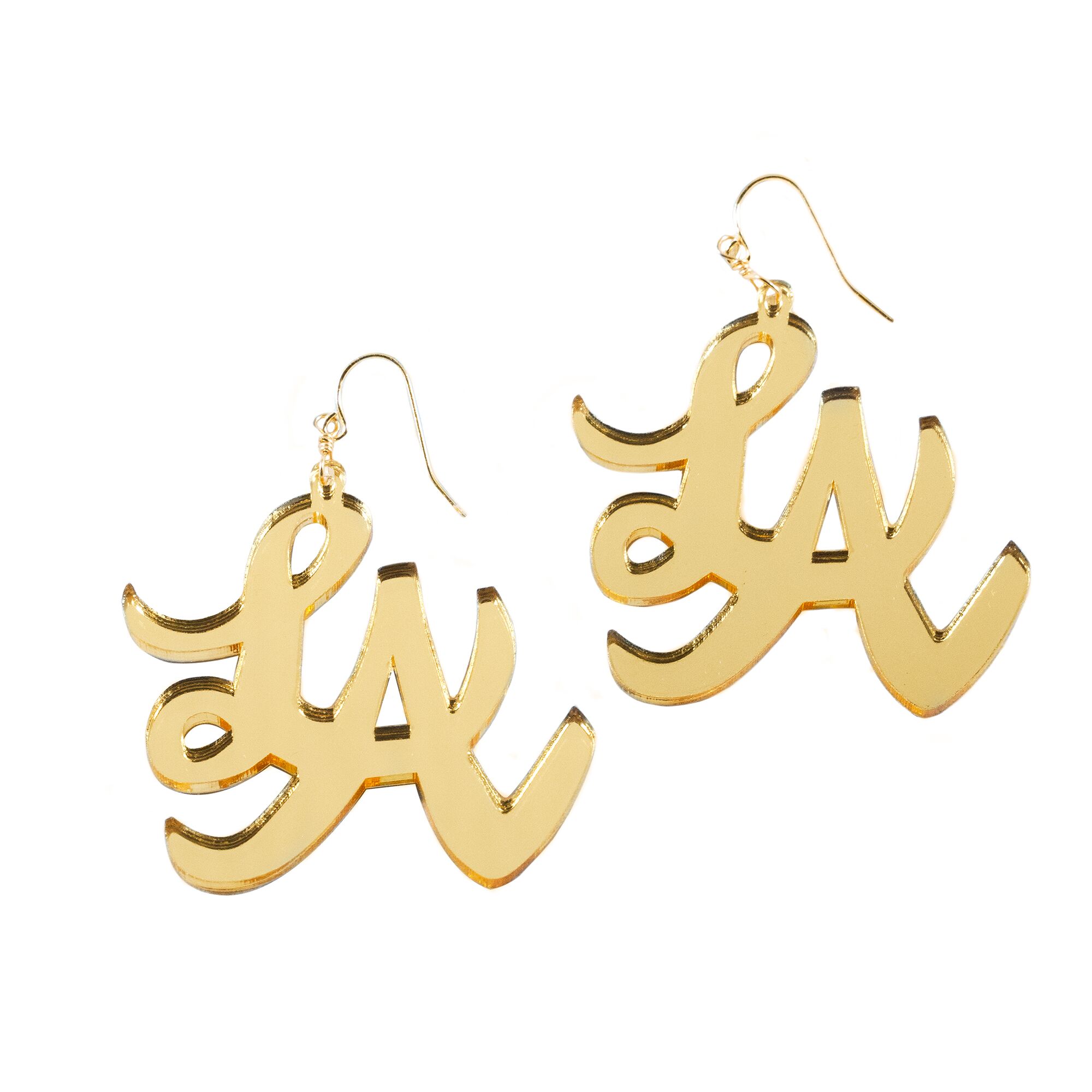 Laser cut mirrored acrylic earrings, which are handmade in Highland Park and from the brand Mi Vida. $28