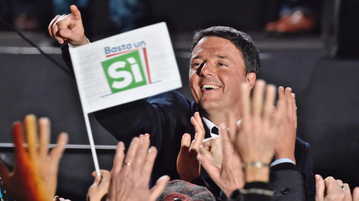 Prime Minister Matteo Renzi addresses a rally on the upcoming Italian constitutional referendum in Florence on Dec. 2, 2016.