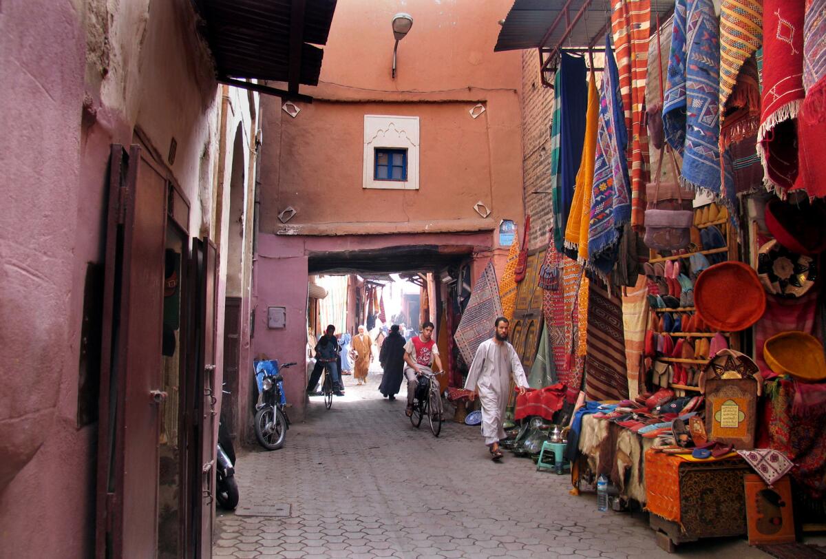 A street in the heart of the medina in Marrakech, Morocco, founded in 1070.