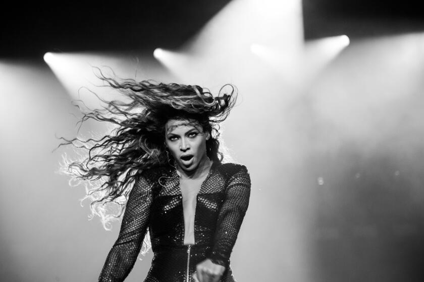 Beyonce performs during the "On the Run Tour" at the Great American Ball Park in Cincinnati.