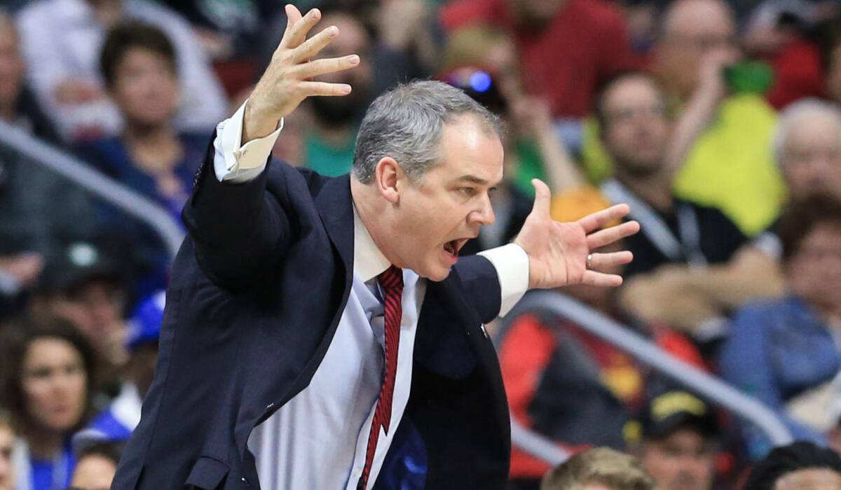 Coach Steve Pikiell yells instructions to his Stony Brook players during an NCAA tournament game against Kentucky on Thursday.