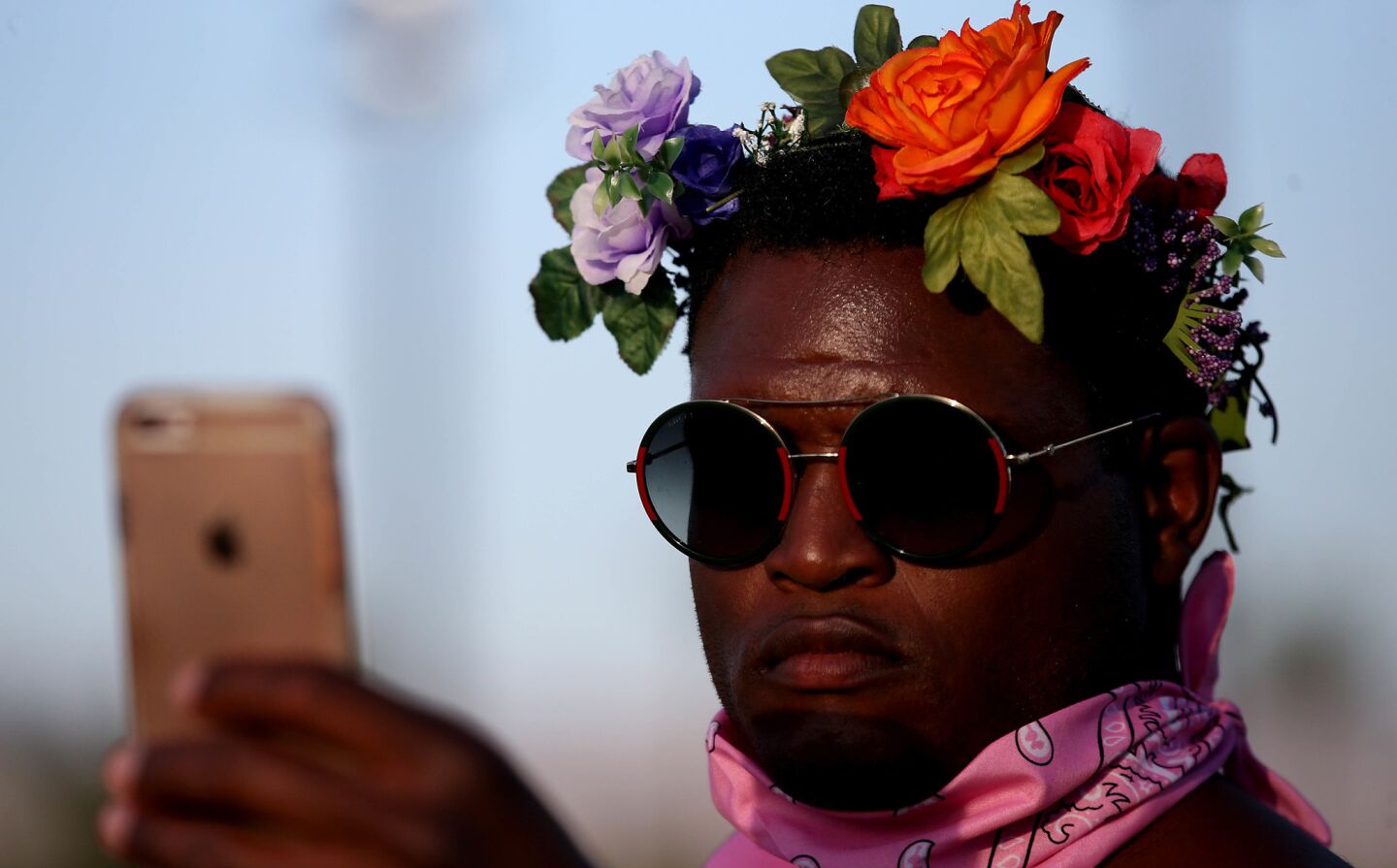 INDIO, CALIF. - APRIL 15, 2017. A festival goer takes a selfie while waiting for a performance by Future on the Coachella Stage on day two of the Coachella Music and Arts Festival in Indio on Saturday, April 15, 2017. (Luis Sinco/Los Angeles Times)