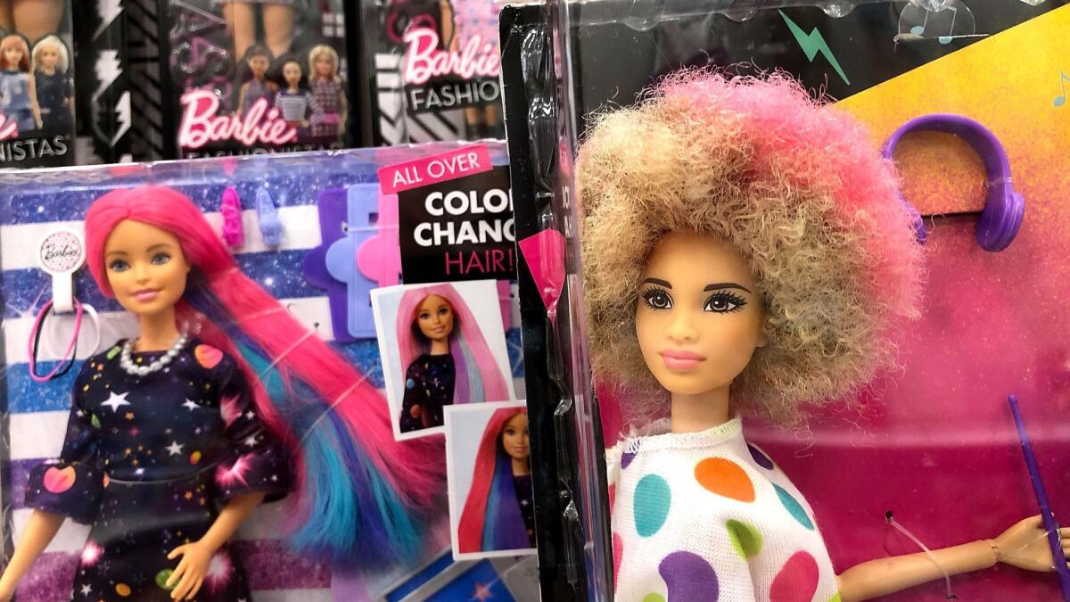 Barbie dolls, made by Mattel, are displayed on a shelf at a Target store on July 25, 2018, in San Rafael, Calif.