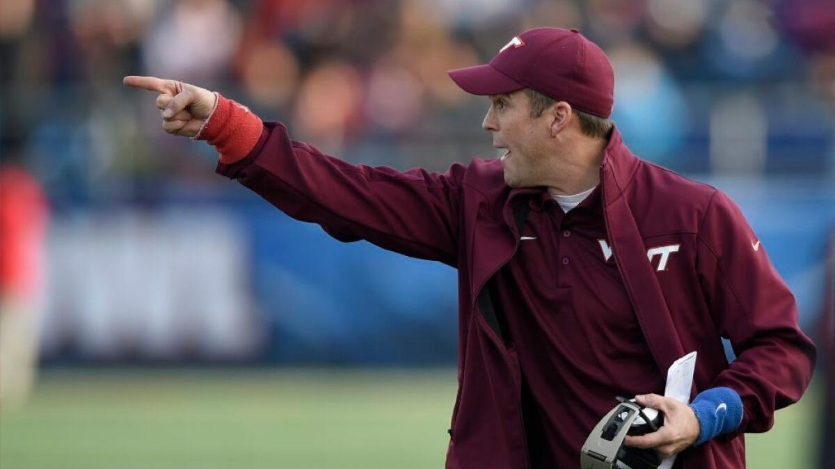 Shane Beamer, pictured in 2014, was fined by his current employer, Georgia, for accepting leaked Wake Forest game plan information during his time with the Hokies.