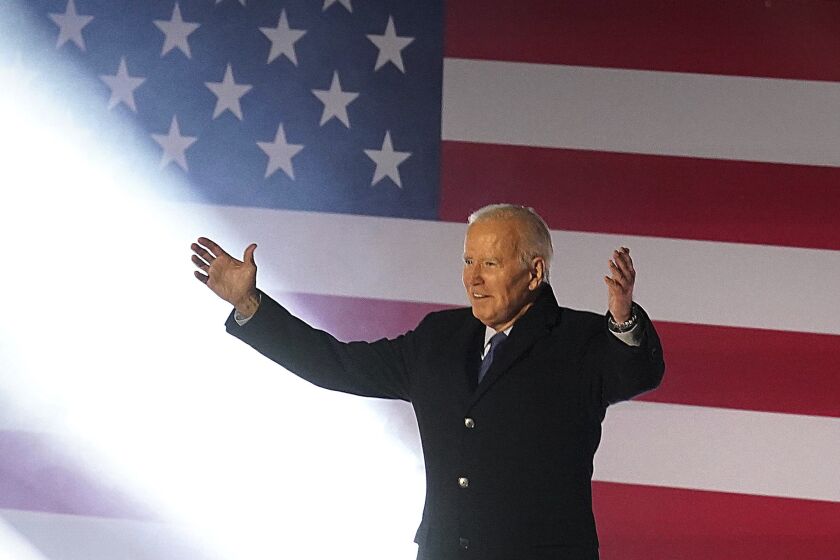 U.S. President Joe Biden arrives on stage to deliver a speech at St. Muredach's Cathedral in Ballina.