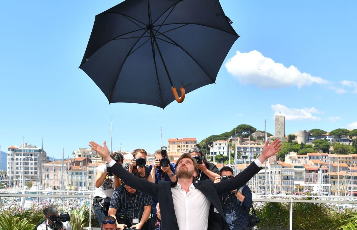 Swedish director Ruben Ostlund poses on May 20, 2017 during a photocall for his new film 'The Square' at the 70th edition of the Cannes Film Festival.