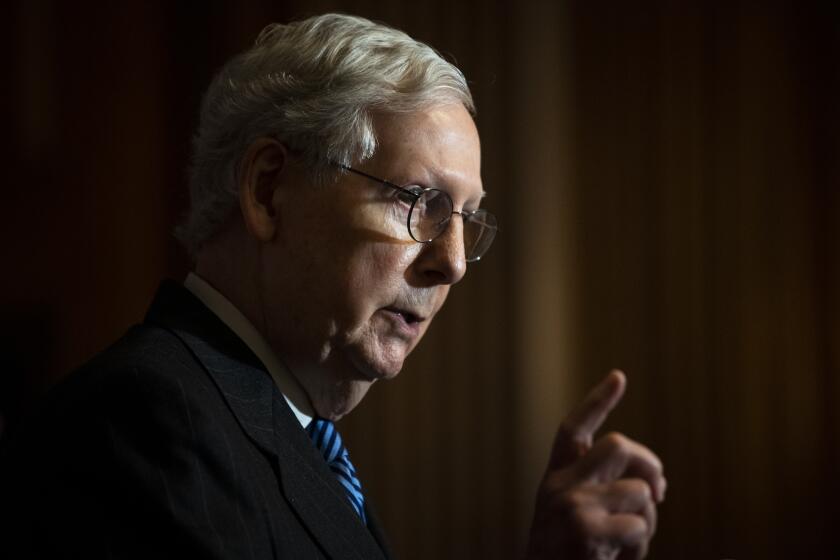 Senate Majority Leader Mitch McConnell of Ky., speaks during a news conference with other Senate Republicans on Capitol Hill in Washington, Tuesday, Dec. 15, 2020. (Caroline Brehman/Pool via AP)