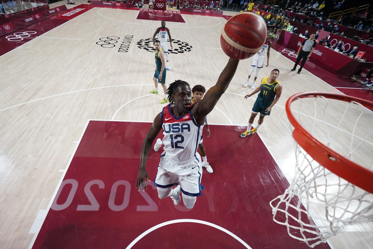 Jrue Holiday leaps for the basket at the Tokyo Olympics.