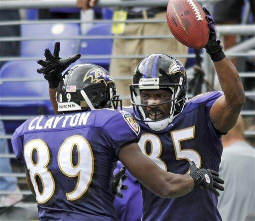 Baltimore Ravens' Derrick Mason prior to the start of an NFL