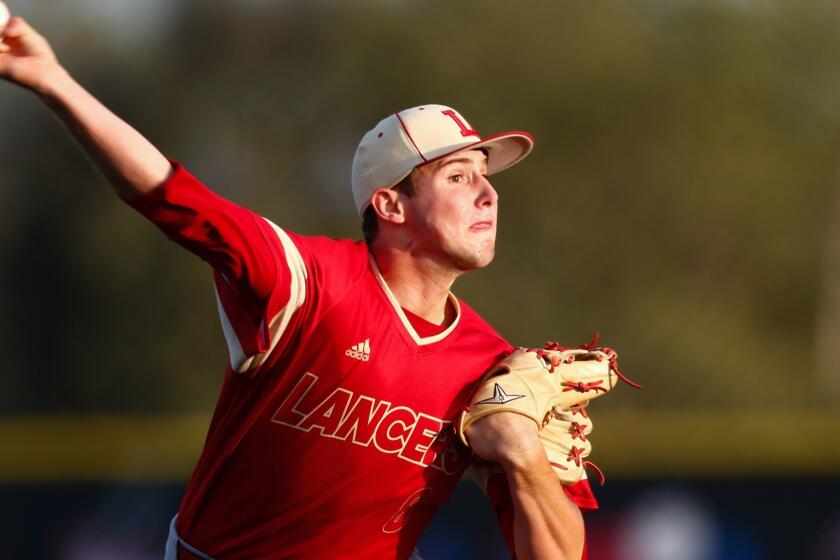 SAN JUAN CAPISTRANO, CALIF. - APRIL 09: Orange Lutheran Lancers Max Rajcic (8) pitches against the JSerra Cathoilic Lions during a high school baseball game at St. Pierre field at JSerra Catholic School on Tuesday, April 9, 2019 in San Juan Capistrano, Calif. (Kent Nishimura / Los Angeles Times)