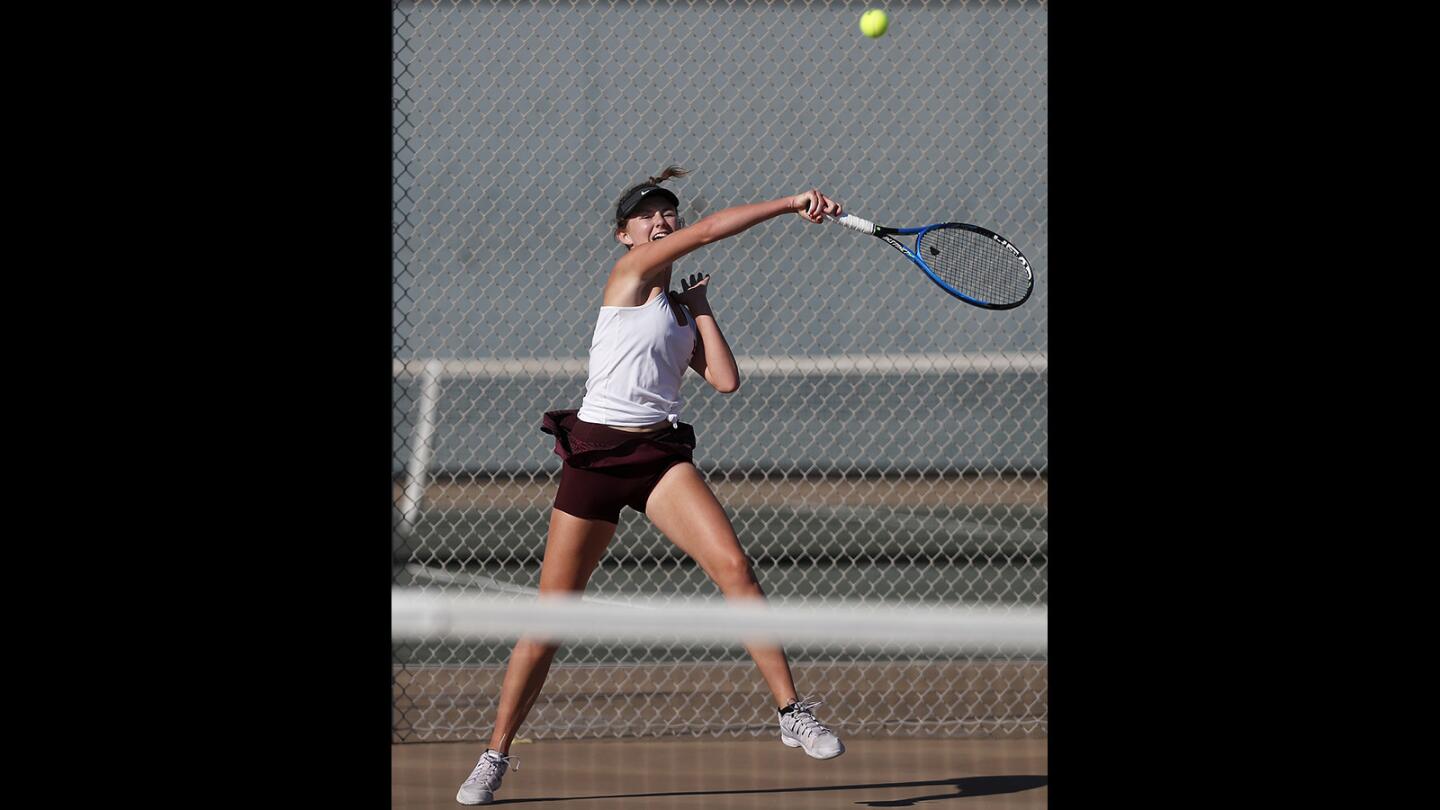 Laguna Beach High's Ella Pachl competes against Edison during a No. 1 singles set in a Wave League match at Edison High on Thursday, Oct. 18.