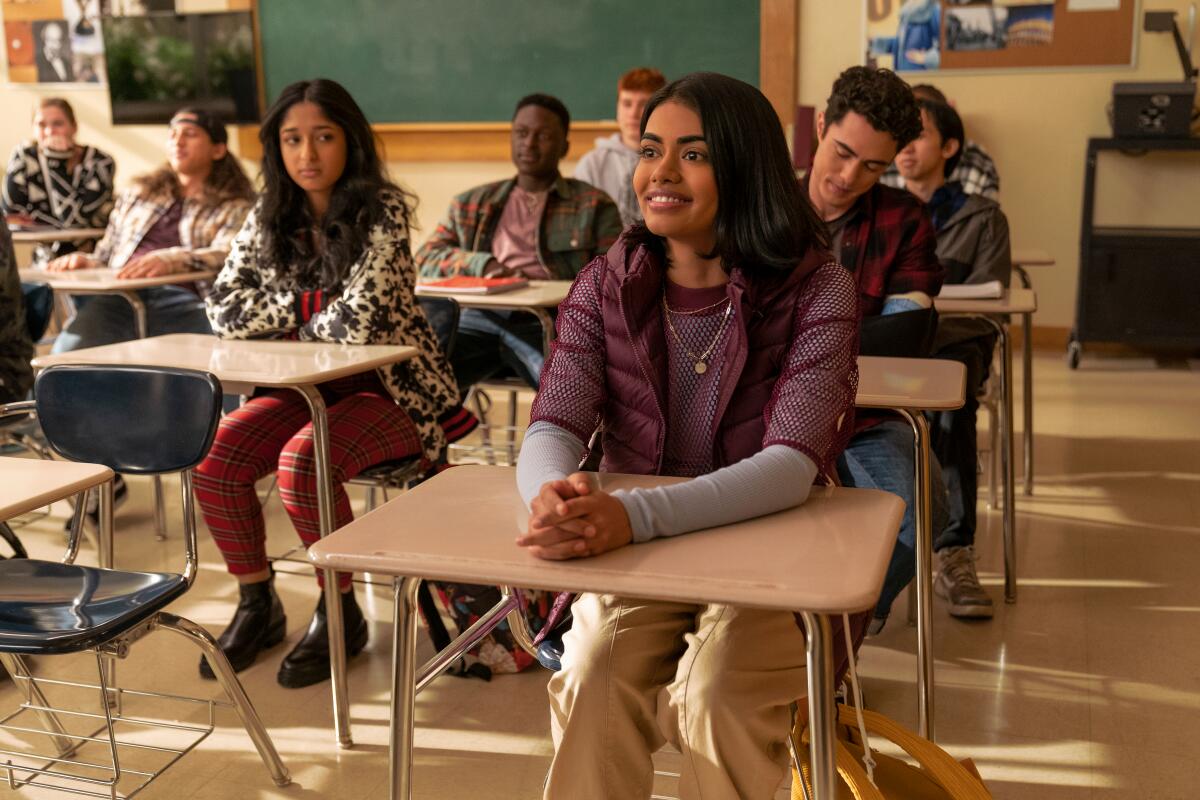 Students sit at desks in a classroom scene in "Never Have I Ever."