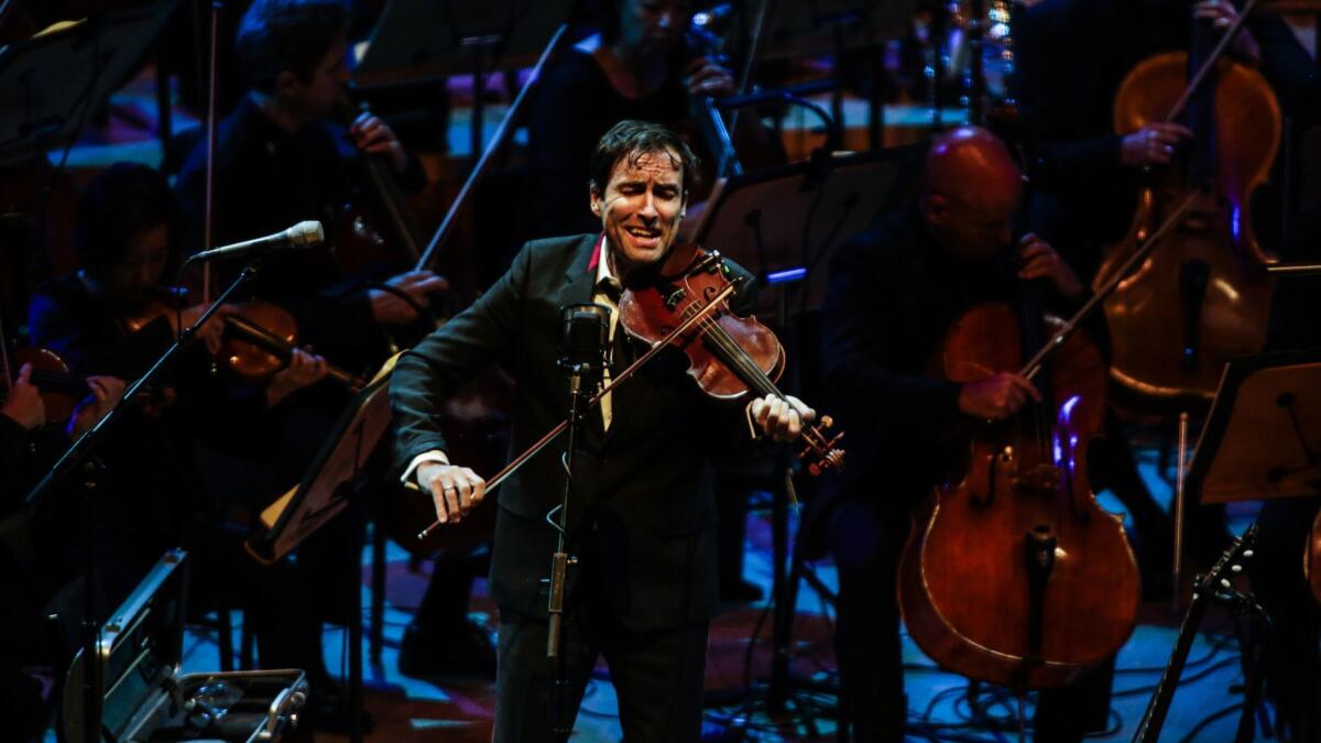 Andrew Bird performs his "Time Is a Crooked Bow" with Gustavo Dudamel and the Los Angeles Philharmonic at Walt Disney Concert Hall as part of the orchestra's L.A. Fest.