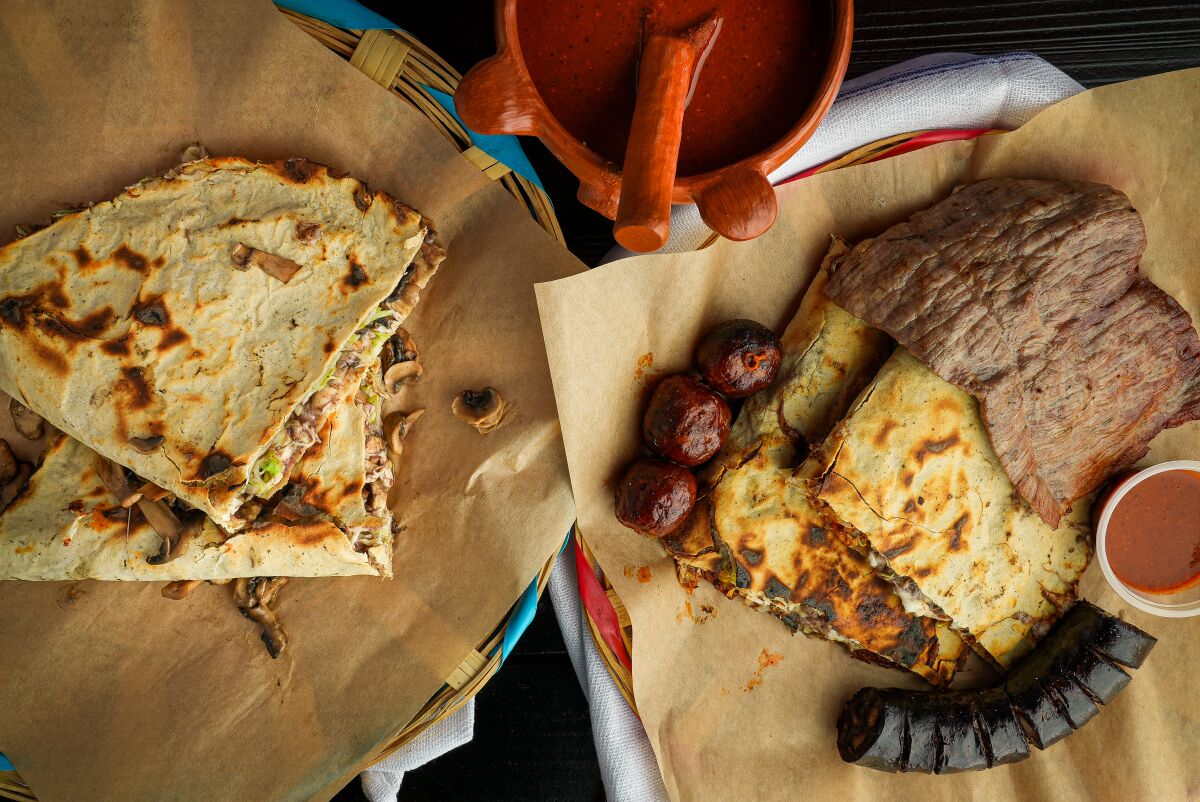 Poncho's Tlayudas' mixta (3 meats) tlayuda includes moronga, chorizo and tasajo