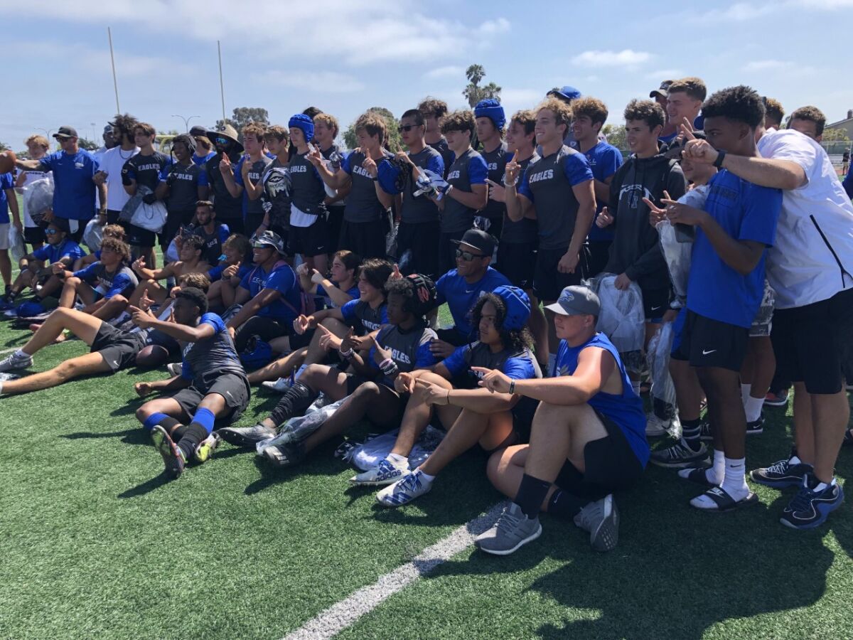 Santa Margarita players celebrate their championship at the Edison seven-on-seven passing tournament.