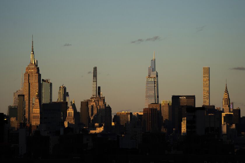 FILE - Light falls on the New York skyline during sunset, Nov. 20, 2022, in New York. In 2022, the county that encompasses Manhattan grew by more than 17,000 residents after losing almost 111,000 people in the previous year during the worst part of the COVID-19 pandemic, according to population estimates released Thursday, March 30, 2023, by the U.S. Census Bureau. (AP Photo/Julia Nikhinson, File)
