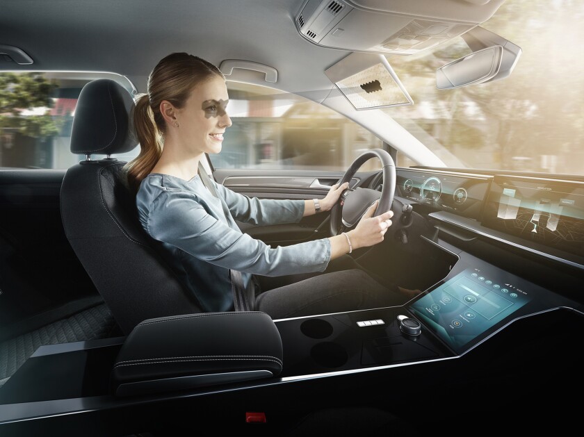 The German auto supplier's CES display showcased a transparent LCD panel and integrated camera visor that shades only the areas of sunlight in the driver's eyes.