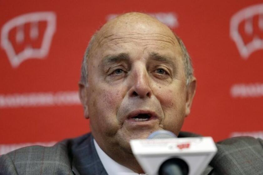 Barry Alvarez will coach Wisconsin in the Rose Bowl game.