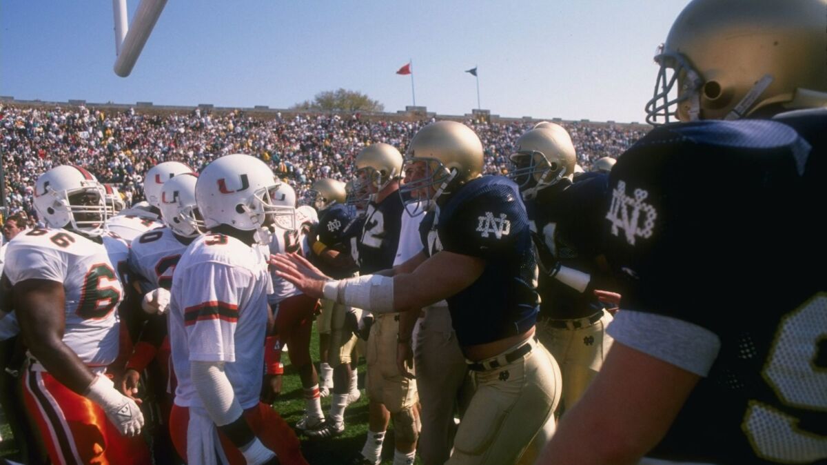 In perhaps the teams' most famous meeting, a game dubbed “Catholics vs. Convicts” in 1988, the then-No. 1 Miami Hurricanes faced fourth-ranked Notre Dame in South Bend, Ind.