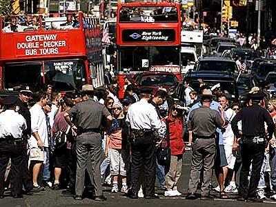 NYPD officers set up barriers at Canal Street