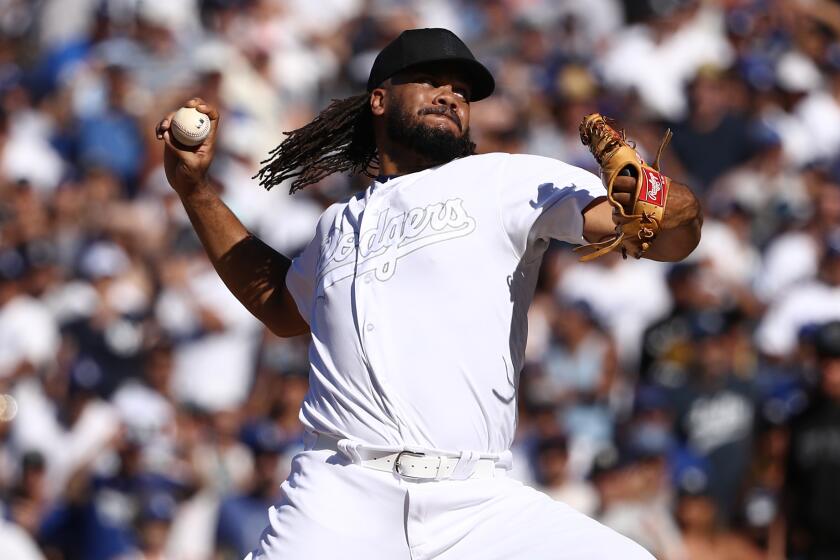 LOS ANGELES, CALIFORNIA - AUGUST 24: Closing pitcher Kenley Jansen #74 of the Los Angeles Dodgers pitches in the ninth inning of the MLB game between the New York Yankees and the Los Angeles Dodgers at Dodger Stadium on August 24, 2019 in Los Angeles, California. Teams are wearing special color-schemed uniforms with players choosing nicknames to display for Players' Weekend. (Photo by Victor Decolongon/Getty Images) ** OUTS - ELSENT, FPG, CM - OUTS * NM, PH, VA if sourced by CT, LA or MoD **