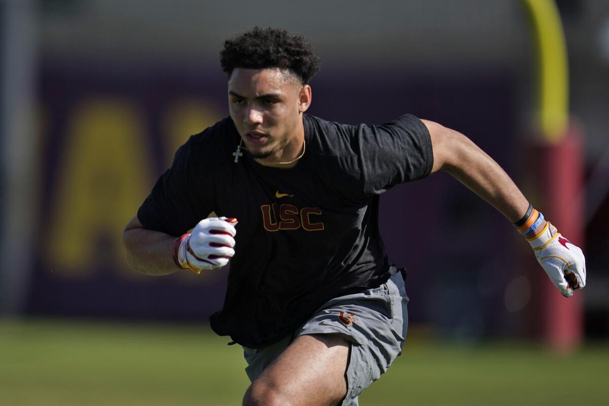 USC wide receiver Drake London runs a drill Friday.