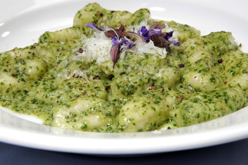 Sage gnocchi with parsley-walnut pesto