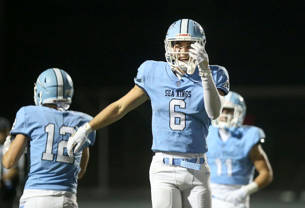 Corona del Mar's John Humphreys is all smiles after catching a touchdown pass in the quarterfinals of the CIF Southern Section Division 3 playoffs against Cajon on Nov. 16 at Davidson Field.