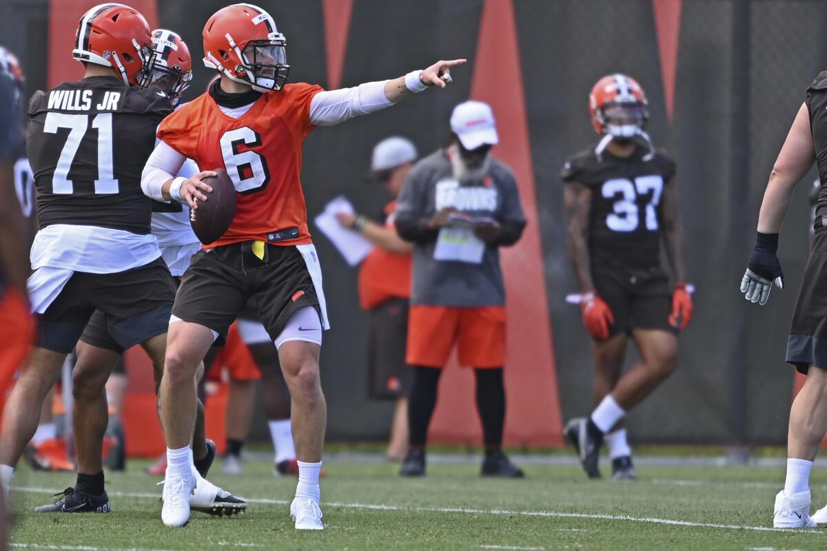 Cleveland Browns quarterback Baker Mayfield (6) points during an NFL football practice at the team training facility, Tuesday, June 15, 2021 in Berea, Ohio. (AP Photo/David Dermer)
