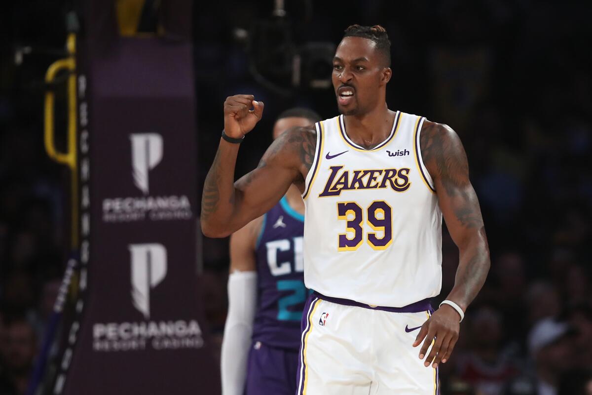 Lakers center Dwight Howard reacts after being fouled during Sunday's win over the Charlotte Hornets.