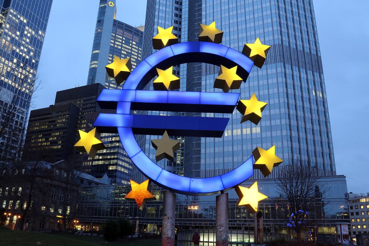A sculpture in Frankfurt, Germany, depicts the symbol of the euro currency. 