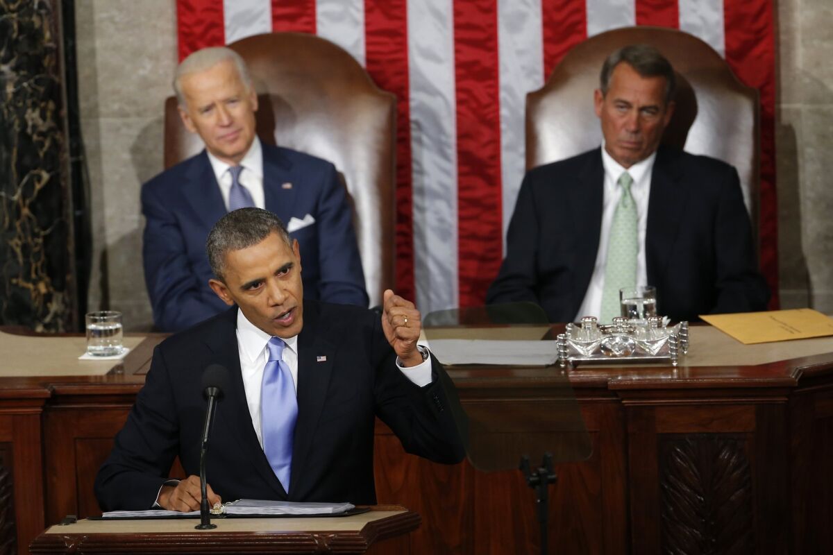 President Obama is seen delivering his State of the Union address in 2014 as Vice President Joe Biden and House Speaker John Boehner of Ohio listen. Obama delivers his 2015 address on Tuesday, Jan. 20.