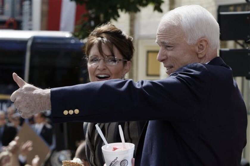 IN this Sept. 5, 2008, file photo, Republican presidential candidate Sen. John McCain, R-Ariz., and vice presidential candidate Alaska Gov. Sarah Palin, attend a rally in Cedarburg, Wis. McCain has worked himself back into a tight race with Barack Obama in Wisconsin, a state that Democrats had hoped would be a stronghold for the Illinois senator. (AP Photo/Stephan Savoia)