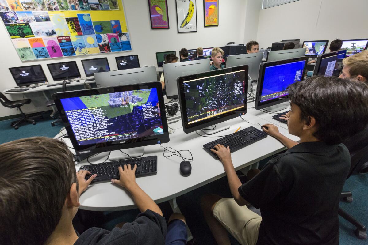 Middle schoolers play "Minecraft" or visit streaming video website Twitch during lunch. (Ricardo DeAratanha / Los Angeles Times)