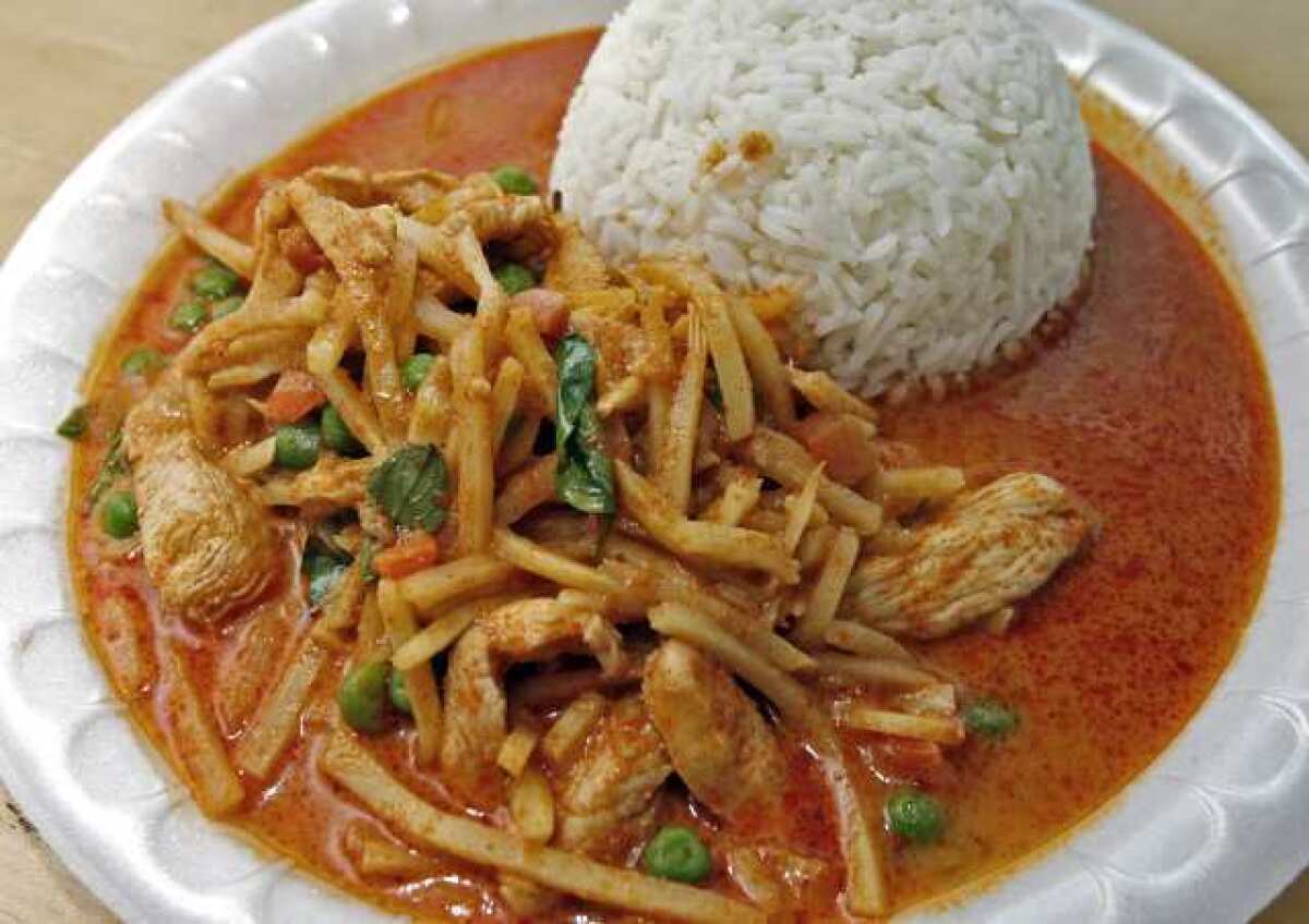 Red curry chicken with bamboo shoots, basil, peas, carrots and rice, from 40 Love Cafe at the Burbank Tennis Center in Burbank.