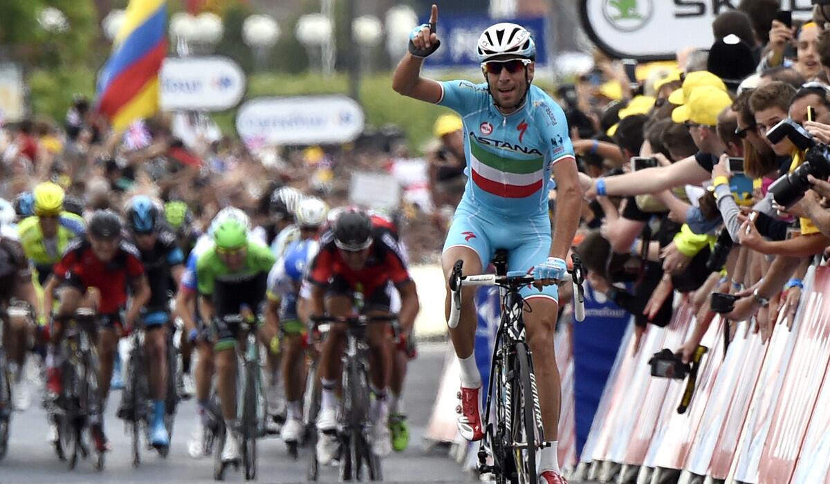 Vincenzo Nibali of Italy celebrates as he crosses the finish line at the end of the second stage of the Tour de France on Sunday in Sheffield, England.