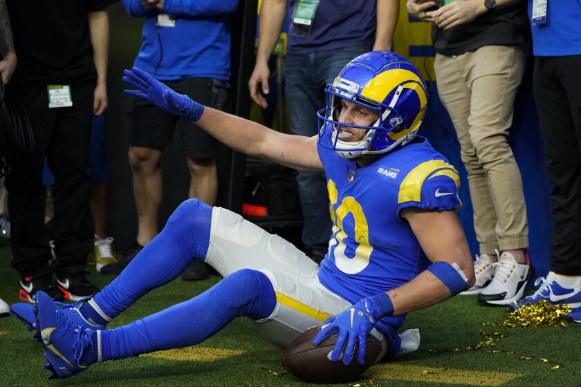 Los Angeles Rams wide receiver Cooper Kupp (10) reacts after catching a pass for a touchdown during the second half of an NFL football game against the San Francisco 49ers, Sunday, Jan. 9, 2022, in Inglewood, Calif. (AP Photo/Marcio Jose Sanchez)