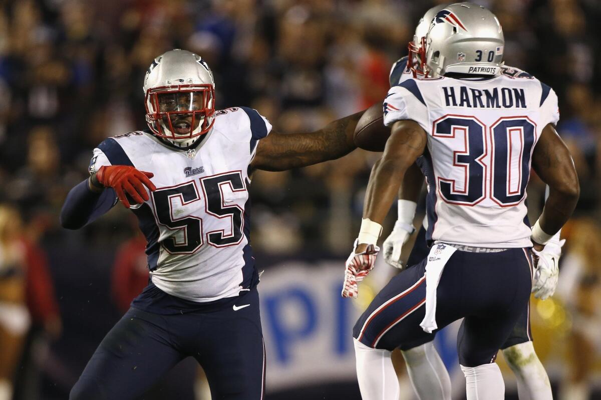 New England linebacker Akeem Ayers celebrates after intercepting a pass against the San Diego Chargers on Dec. 7.