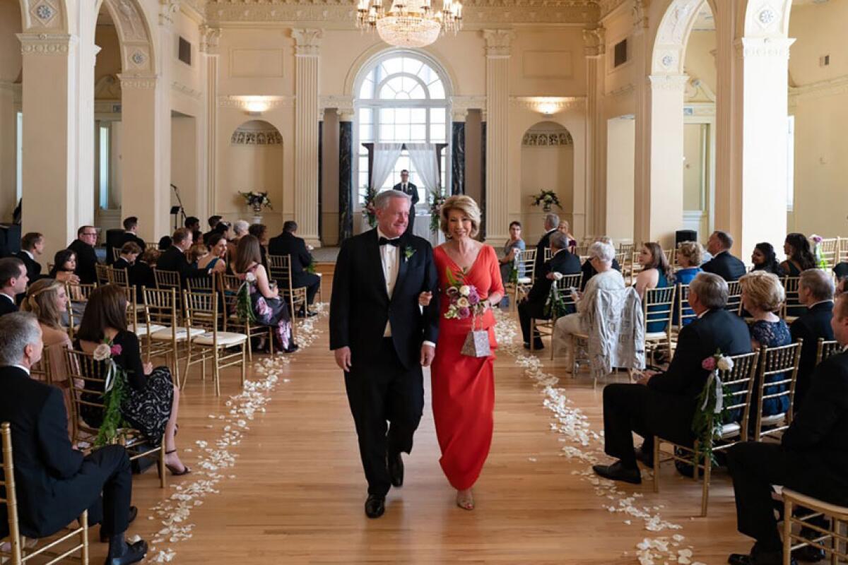 White House Chief of Staff Mark Meadows and his wife, Debbie, during their daughter's wedding May 31.