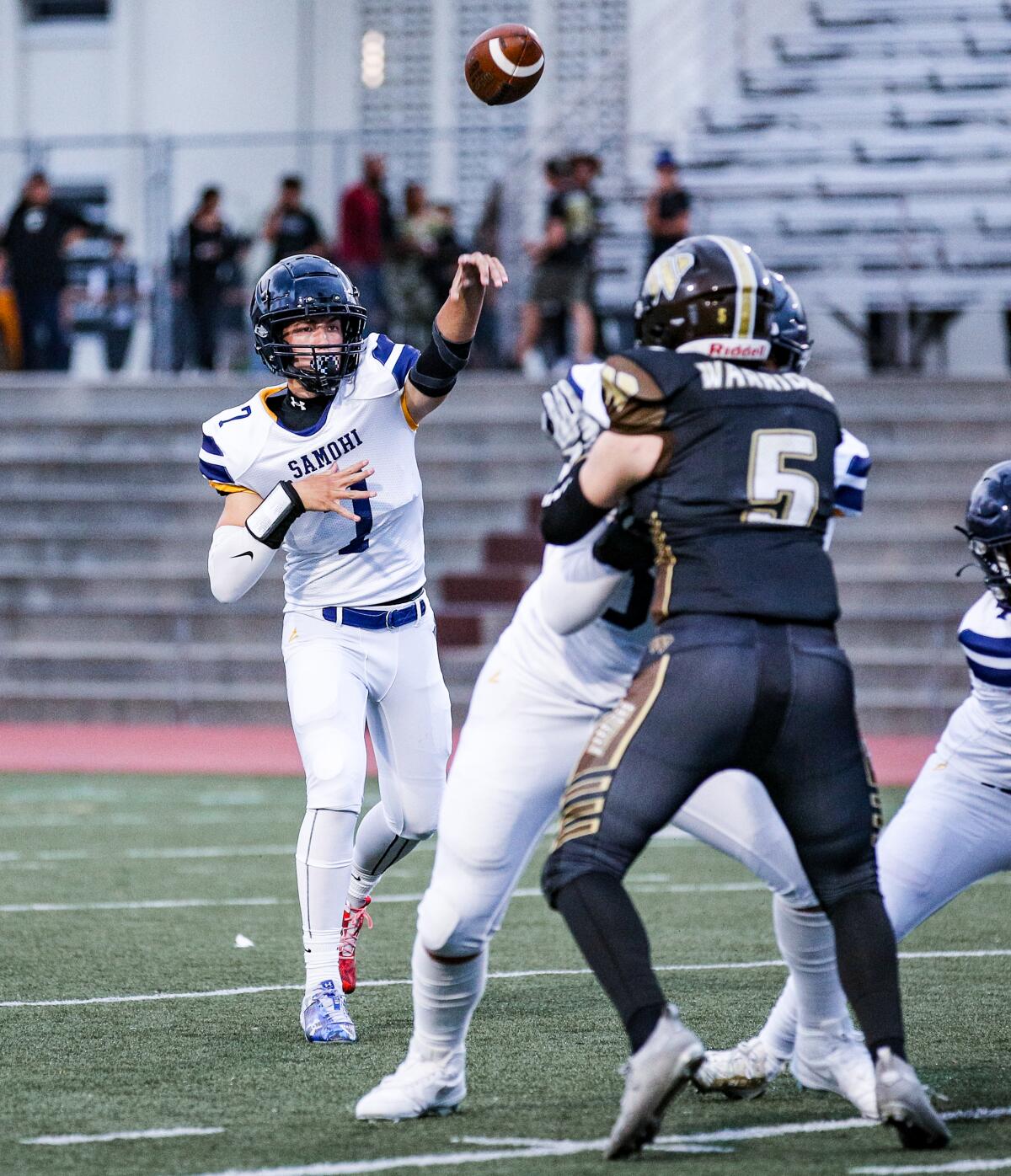 Sophomore quarterback Wyatt Brown of Santa Monica throws a pass against West Torrance on Friday night.
